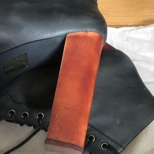 Iconic black leather Jeffrey Campbell Lita boots.